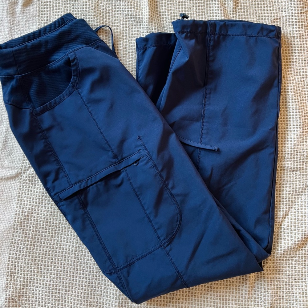 Dark blue infinity scrub pants. Size medium. Scrunch buttons